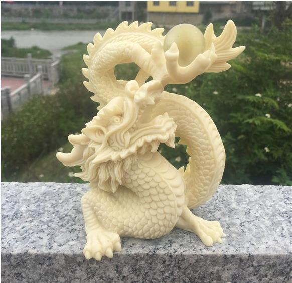 [ finest quality. tree carving ]. carving . dragon .., record dragon ornament 