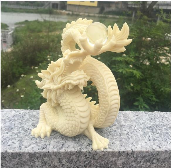 [ finest quality. tree carving ]. carving . dragon .., record dragon ornament 