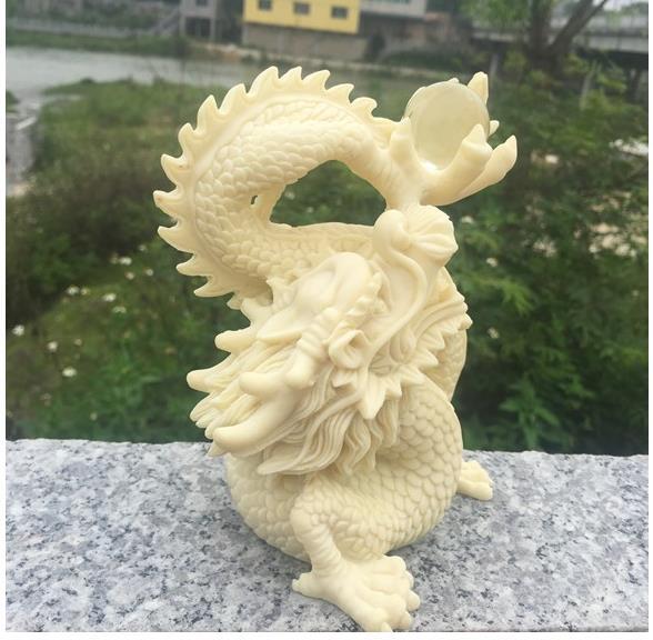 [ finest quality. tree carving ]. carving . dragon .., record dragon ornament 