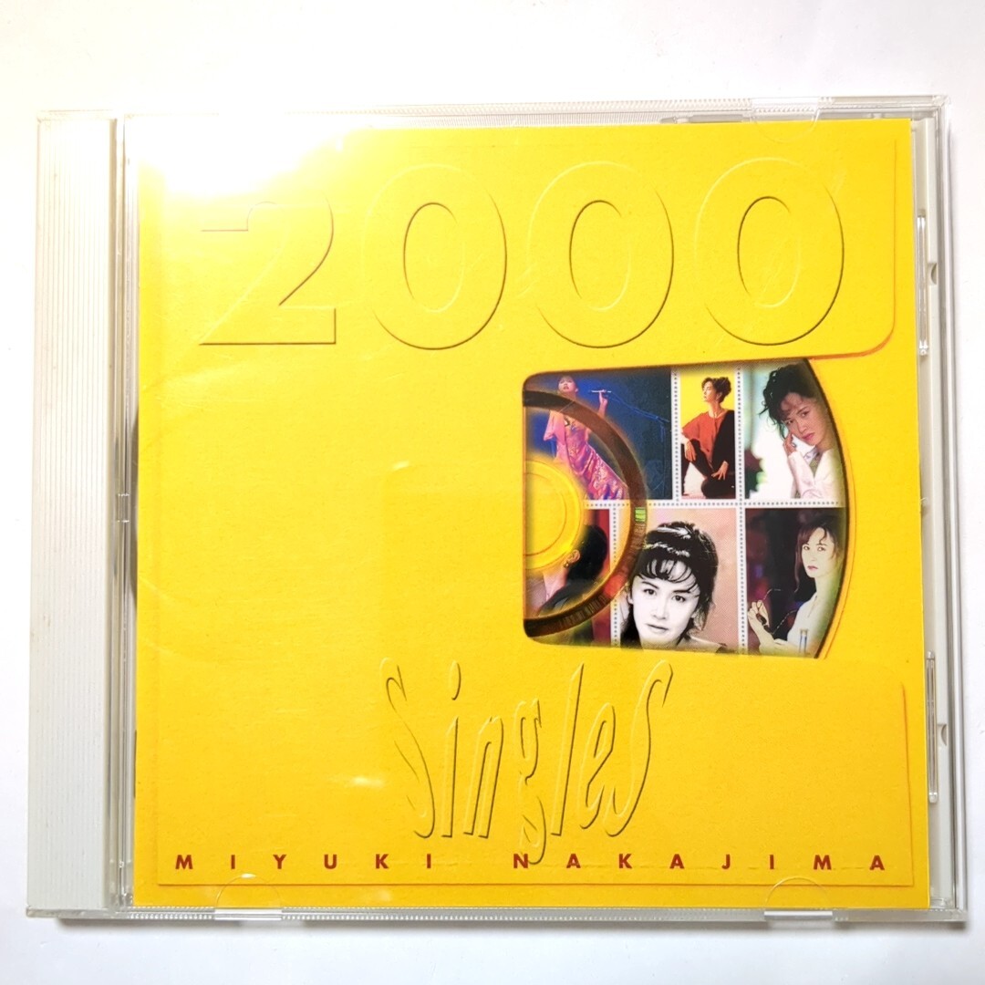 送料無料 中島みゆき CD ベストアルバム 「Singles 2000」 糸 地上の星 空と君のあいだに ヘッドライト・テールライト ファイト!