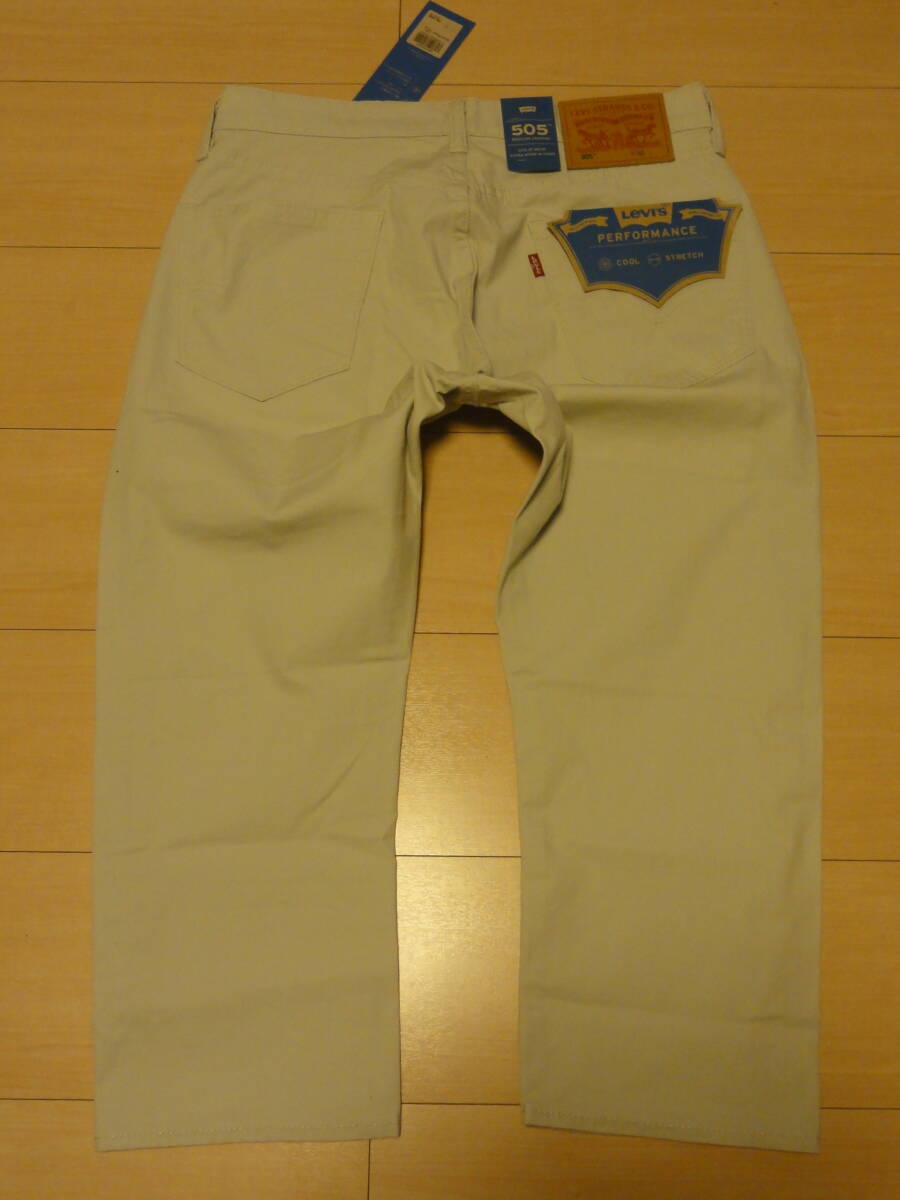 格安税込7700円未使用タグ付き・LEVI'S 505(リーバイス)・オフホワイト～カーキ系地・高級COOLMAXモデル・7分丈系ジーンズ 30 W78cm位_画像1