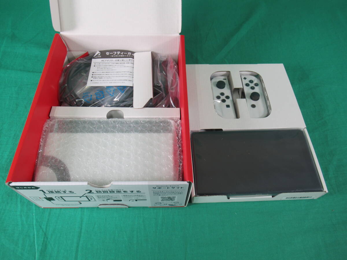 60/Q842* Nintendo switch body *Nintendo Switch body have machine EL model White white *HEG-S-KAAAA* outer box damage equipped * unused goods 