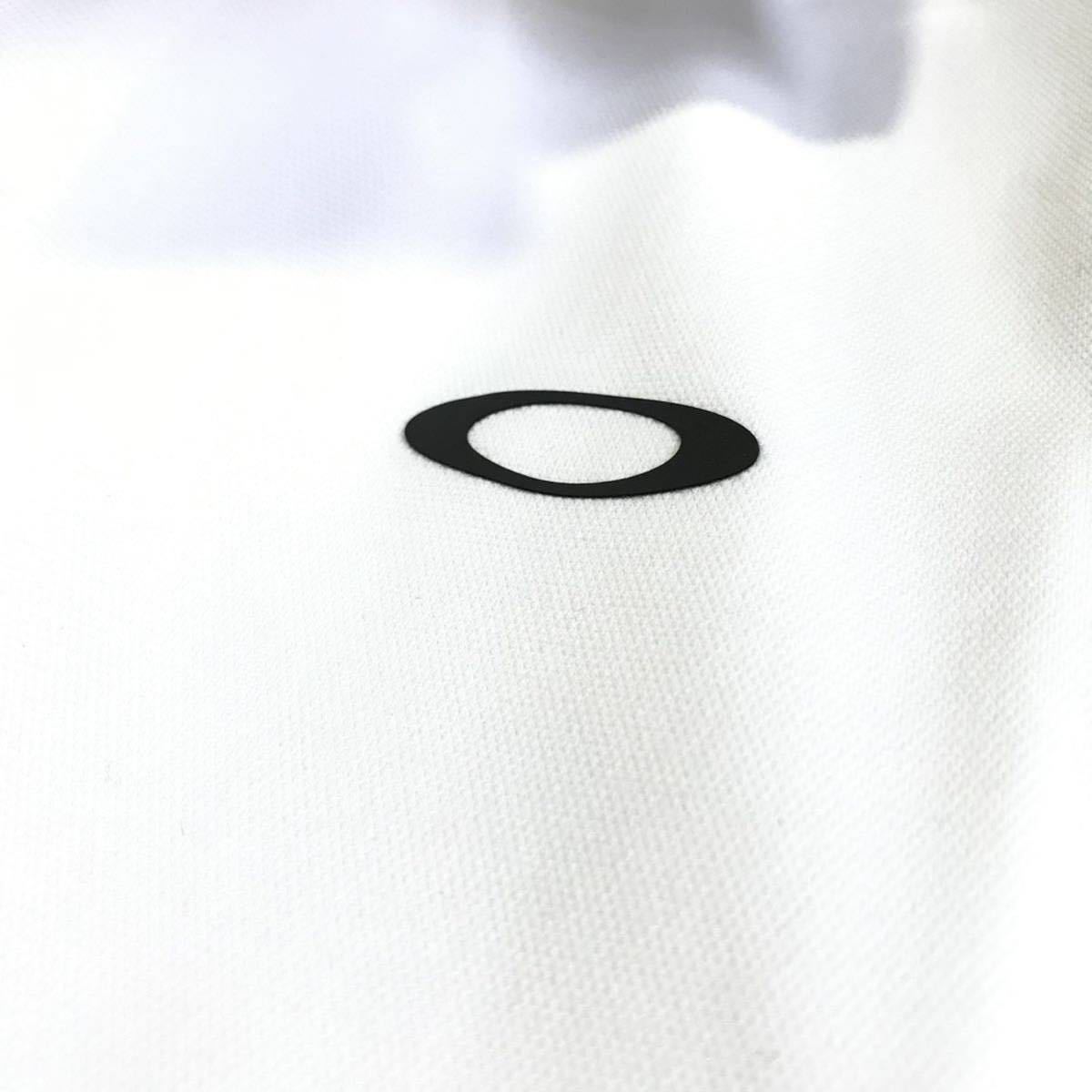 ♯C057新品【日本Lサイズ】白 ゴルフ オークリー Enhance SS Polo Essential 12.0ポロシャツ 半袖 吸汗速乾 総柄 OAKLEYの画像3