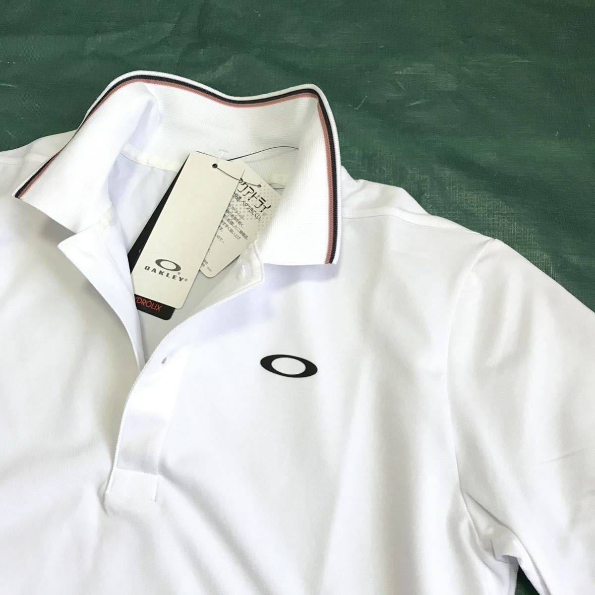 ♯C057新品【日本Lサイズ】白 ゴルフ オークリー Enhance SS Polo Essential 12.0ポロシャツ 半袖 吸汗速乾 総柄 OAKLEYの画像2
