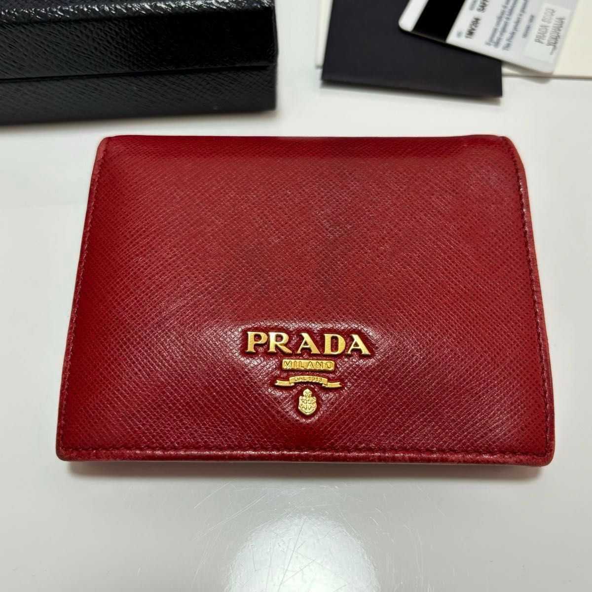 【刻印あり確実正規品】プラダ 二つ折り財布 サフィアーノ PRADA 1MV204 FUOCO 赤　レッド