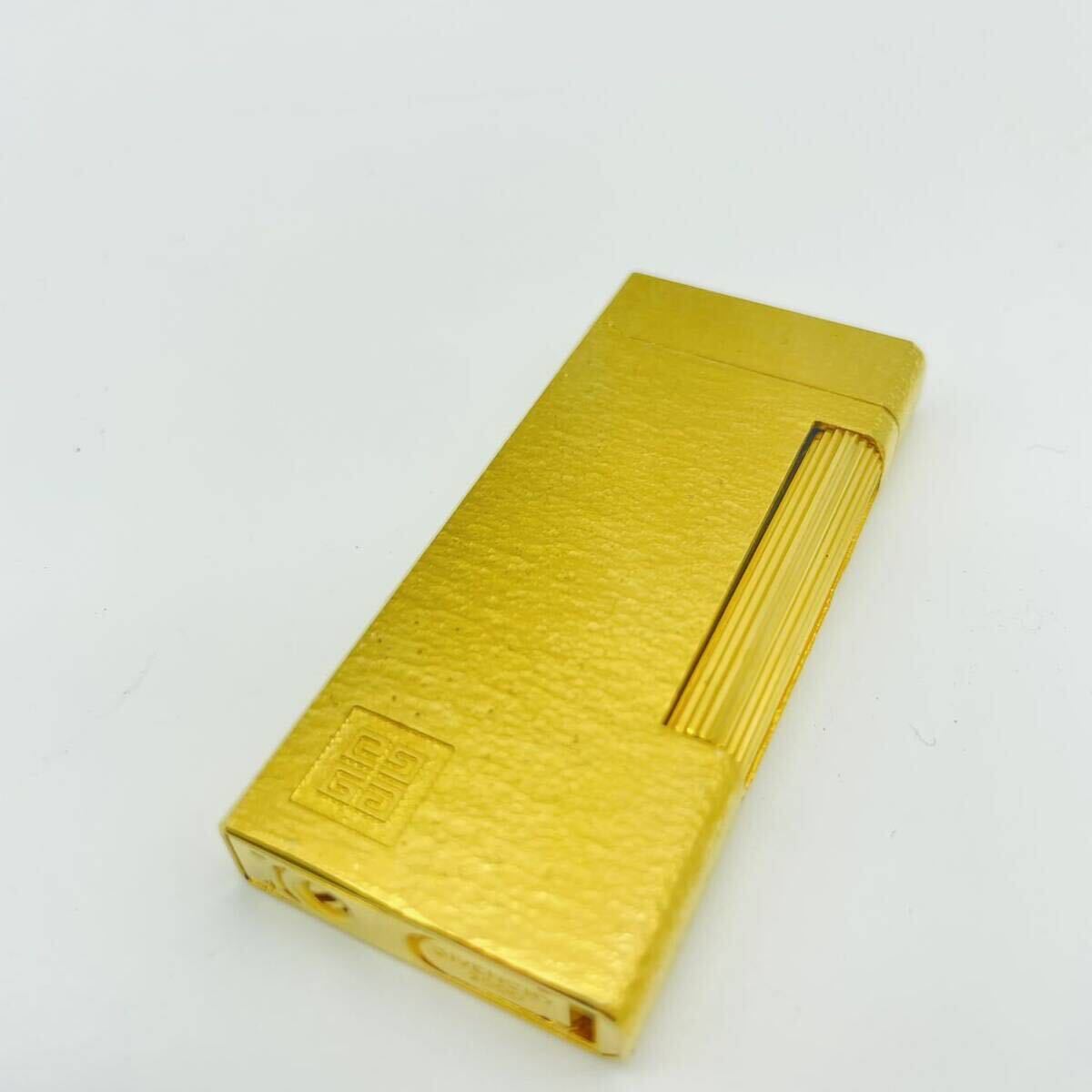[1 иен старт ]GIVENCHY/ Givenchy 2000 газовая зажигалка Gold цвет MG120