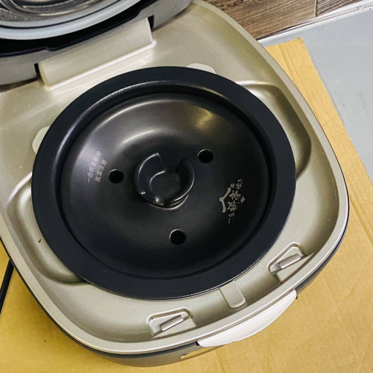 TIGER Tiger JPL-S100 KT earthenware pot pressure IH jar rice cooker rice cooker 5.5. used power supply has confirmed 
