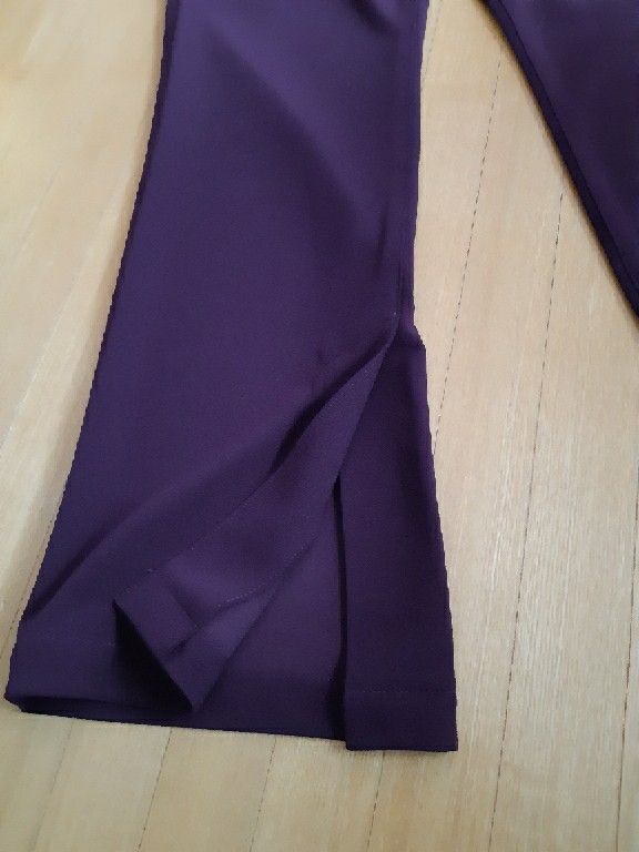タグ付き未使用 ワールドJET ジェット ウォッシャブル ストレッチ裾スリットフレアパンツ S(2)ボルドー紫
