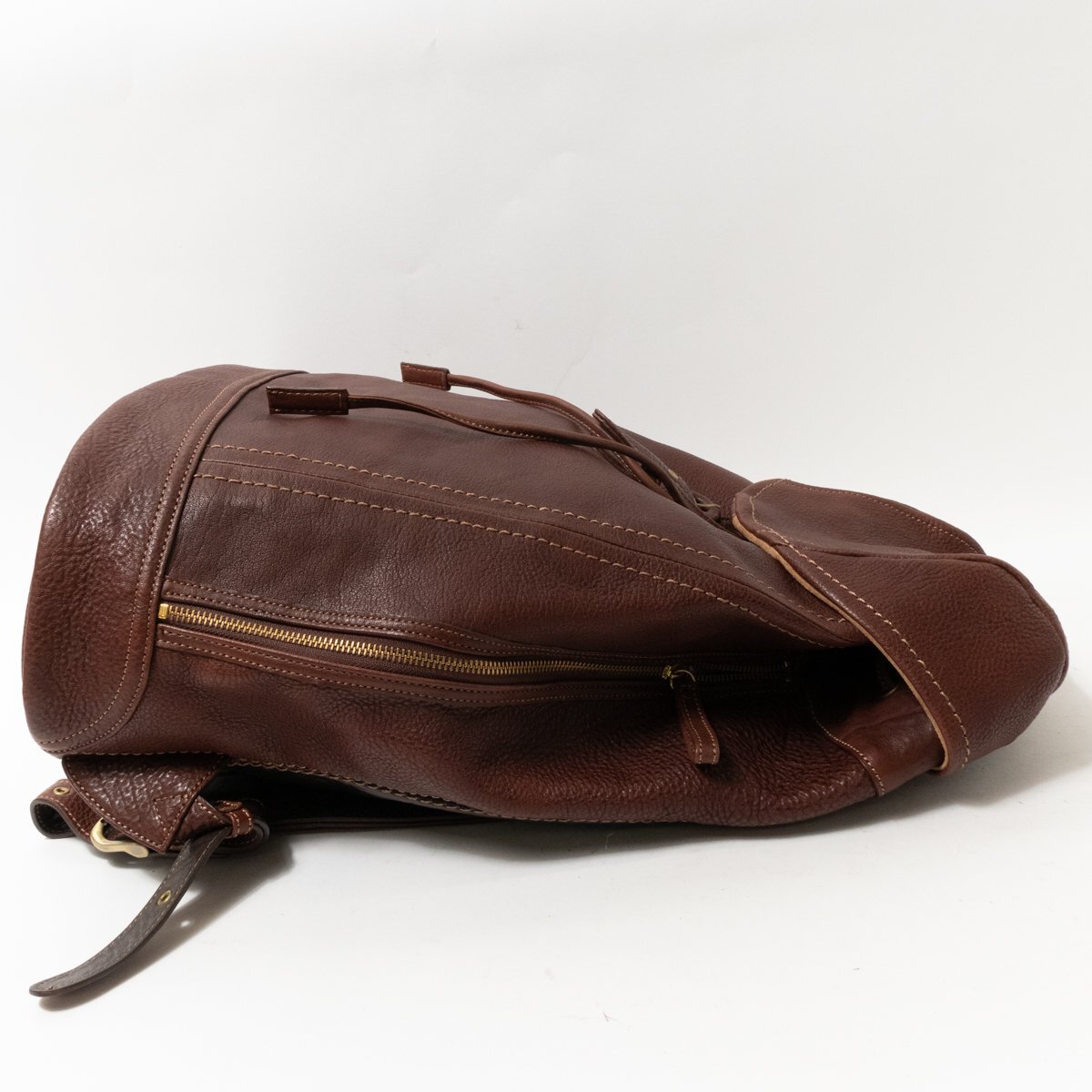 [1 jpy start ] earth shop bag manufacture place TSUCHIYA KABAN pouch type rucksack backpack leather original leather dark brown hook opening and closing casual bag 