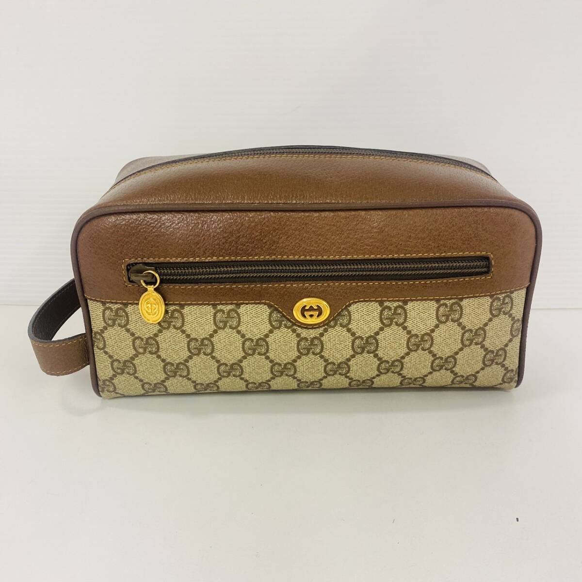 16169/ GUCCI グッチ GG柄 クラッチバッグ セカンドバッグ ポーチ ブラウン 鞄 ブランド品_画像1