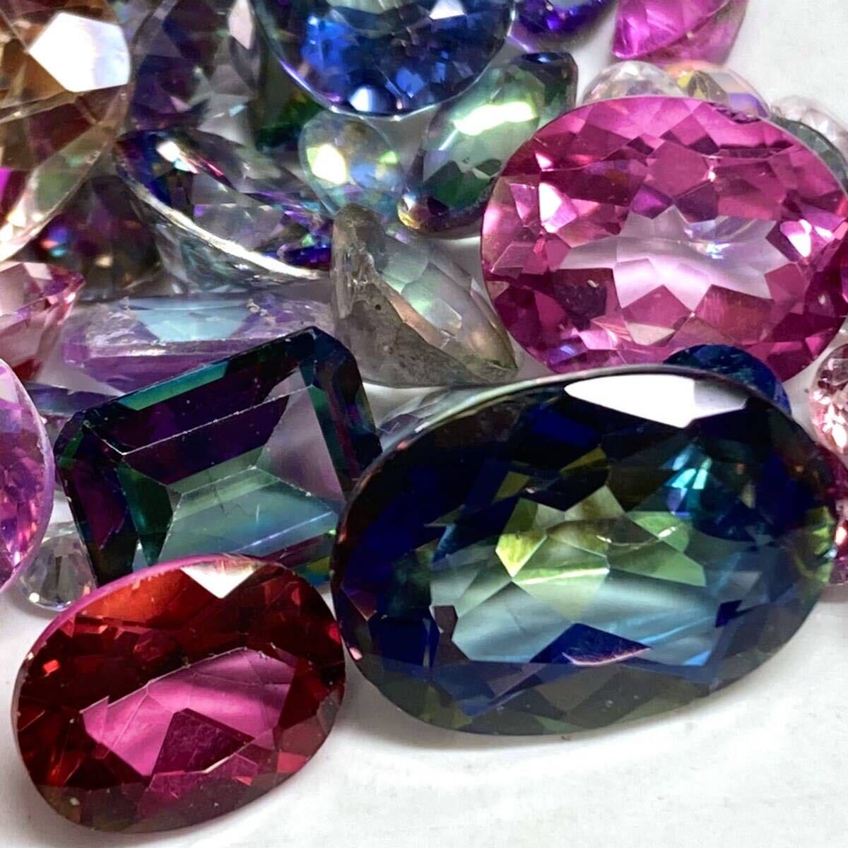 # Mystic topaz / quartz . summarize #m approximately 140ct/28g weight approximately loose unset jewel gem jewelry jewelry topaz topaz quartz quartz CE0
