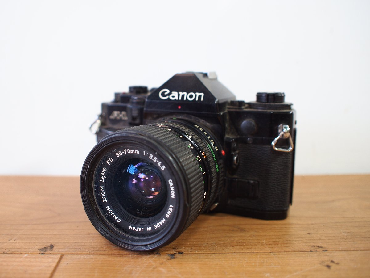 ☆【1T0419-11】 Canon キャノン A-1 LENS FD 35-70mm 1:3.5-4.5 フィルムカメラ 一眼レフカメラ ジャンク_画像1