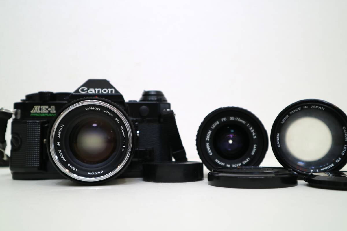 Canon キャノン　AE-1 PROGRAM　ブラックボディ ＋ 3本レンズ　50mm 1:1.4 /35-70mm 1:3.5-4.5/200mm 1:4 S..S..C._画像1
