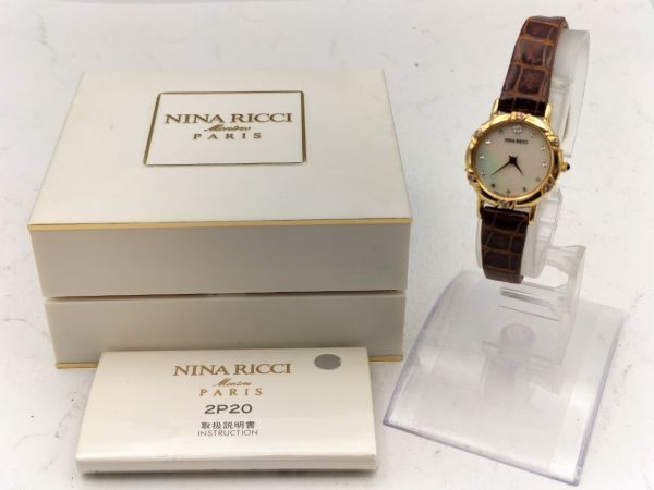 S59 三 不動品 1円～ ニナリッチ NINA RICCI クオーツ 2P20-0630 シェル文字盤 ゴールドカラー レディース 腕時計 箱付き_画像1