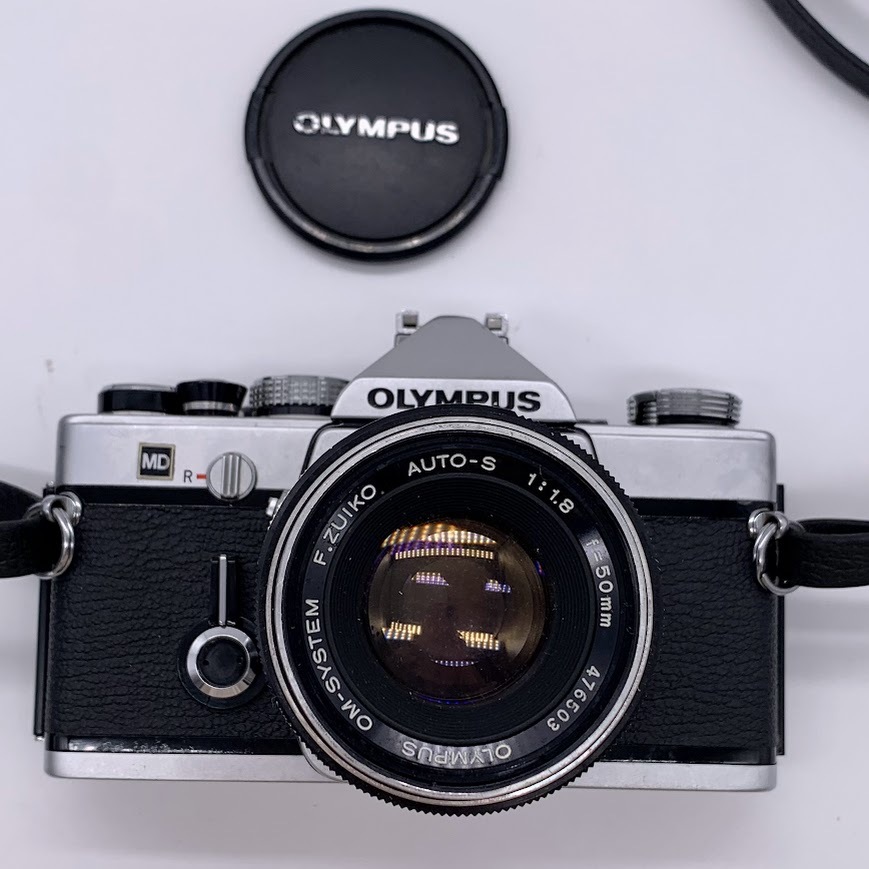 [K-53]OLYMPUS Olympus OM-1 film camera F.ZUIKO AUTO-S 1:1.8 f=50mm telephoto lens Kenko SKYLIGHT 55mm strobo present condition goods 