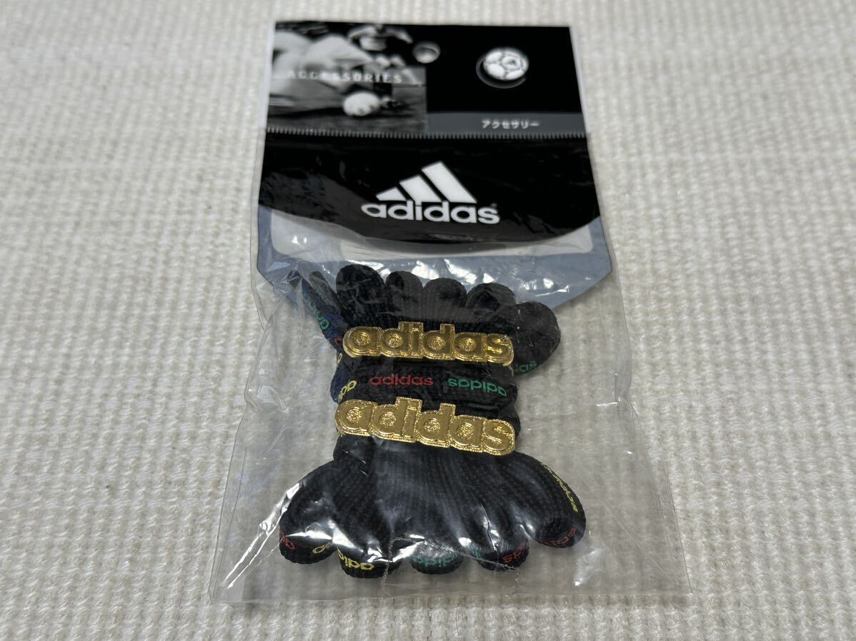 新品 未使用 未開封 アディダス adidas 靴紐 ひも シューレース ブラック 黒 黄 赤 緑ロゴ 120cm スーパースター スタンスミス 金 デュブレ_画像1