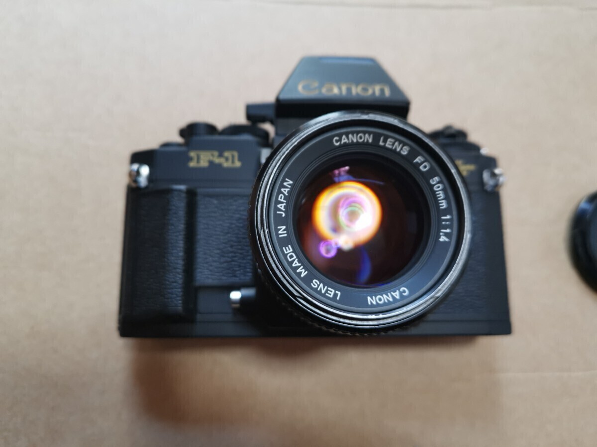 CanonキャノンNewF-1　1984年 ロスオリンピックモデル.極美品.NewFD50㎜F1.4_画像1