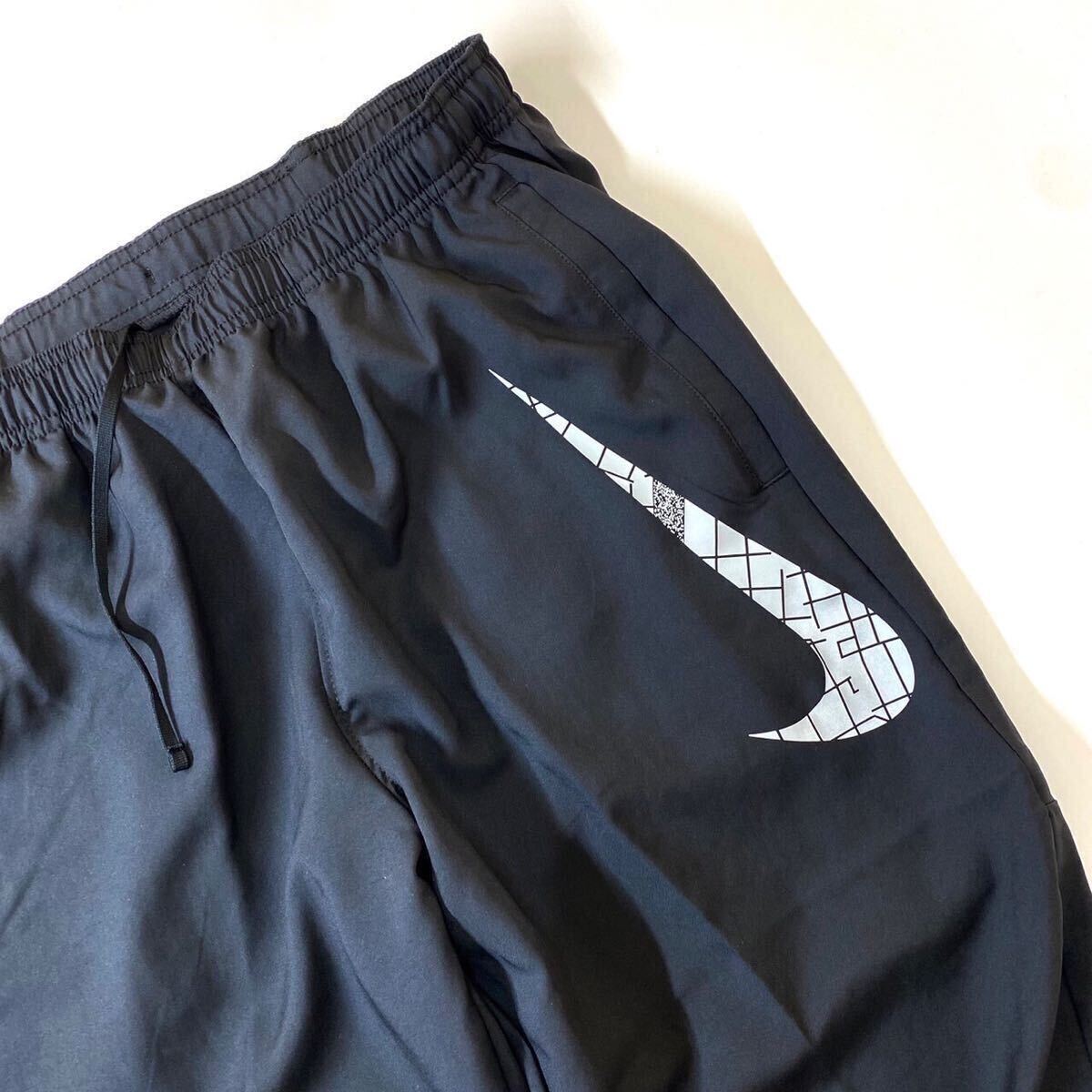 NIKE Nike DF Ran CHLLGRu-bnFLS брюки бег ветровка брюки DQ6490-010 размер M