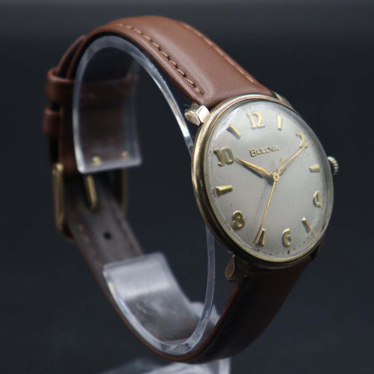 BULOVA ブローバ 手巻き 飛び数字文字盤 ゴールドカラー 動作品ジャンク 新品革ベルト アンティーク メンズ腕時計の画像4