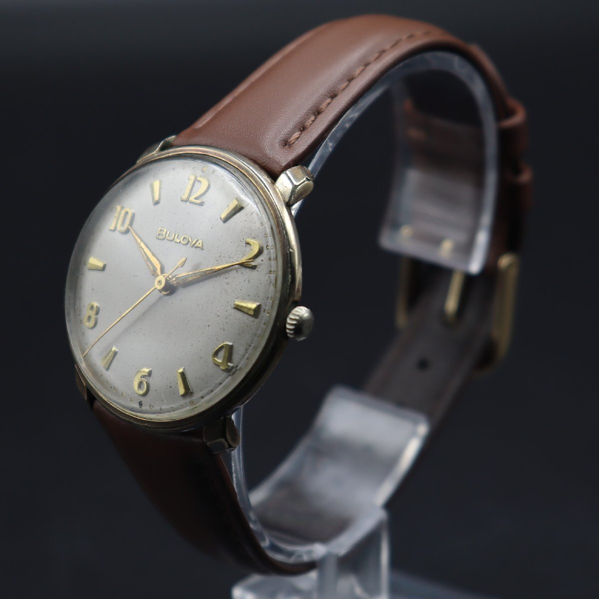 BULOVA ブローバ 手巻き 飛び数字文字盤 ゴールドカラー 動作品ジャンク 新品革ベルト アンティーク メンズ腕時計の画像2