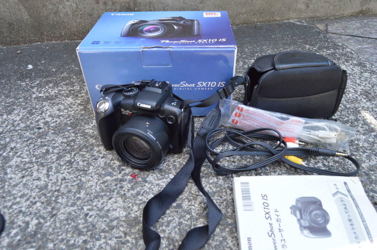 ジャンク品 動作未確認 Canon キヤノン PowerShot SX10 IS コンパクトデジタルカメラ _画像1