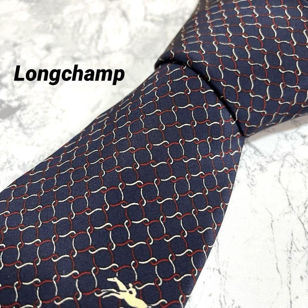 美品激レア Longchamp ロンシャン　ブランドネクタイ シルク100％ 入手困難 ネイビー　チェック柄　ビジネススーツ　絹　高級_画像1