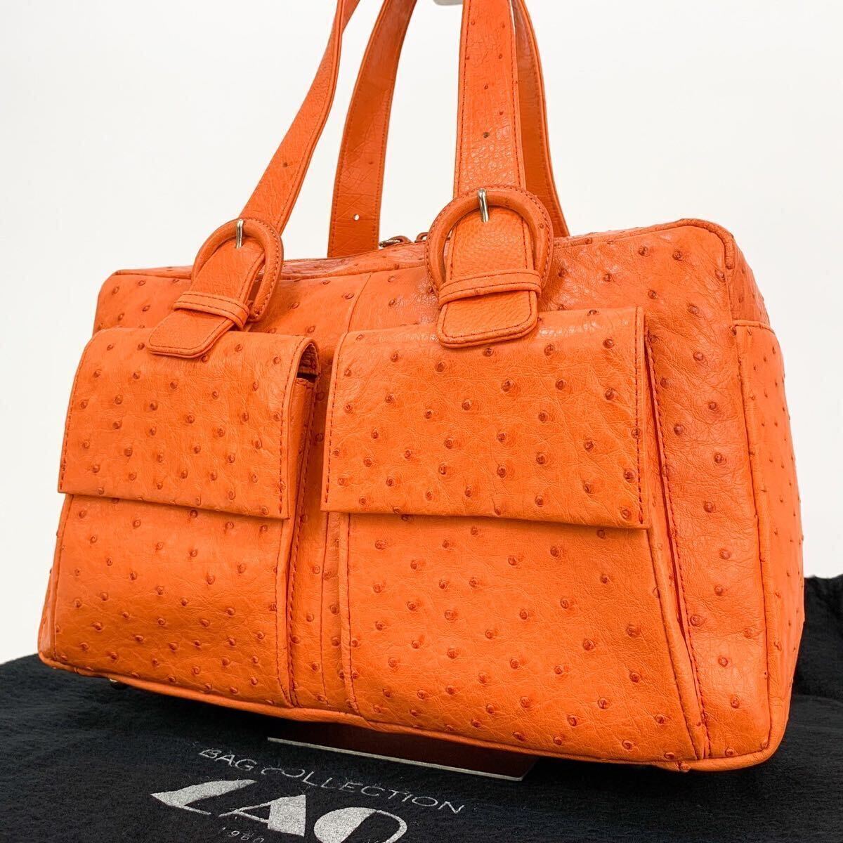 не использовался хранение товар ZAO The o- страус кожа Ostrich кожа ручная сумочка большая сумка сумка orange 
