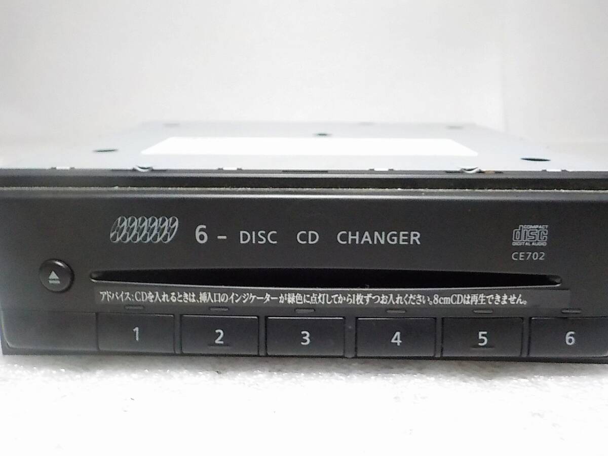  Junk Nissan original original OP option CD changer 6 disk change CE702 PN-2302U