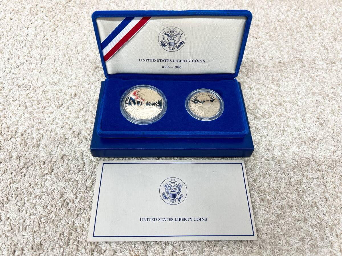 A559　UNITED STATES LIBERTY COINS　アメリカ　リバティコイン　記念硬貨　箱付き　自由の女神　1986年　銀貨　シルバー_画像1