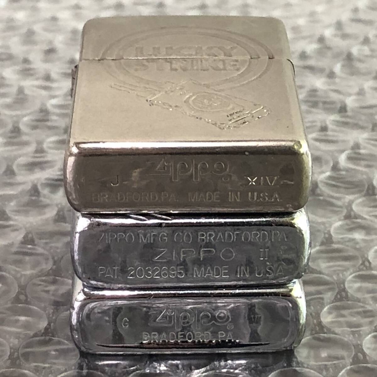 YB100270(053)-101/IR4000【名古屋】Zippo ジッポー 3点まとめ J XⅣ LUCKY STRIKE / Ⅱ PAT. 2032695 / C Ⅵ Gold Coast Australia_画像3