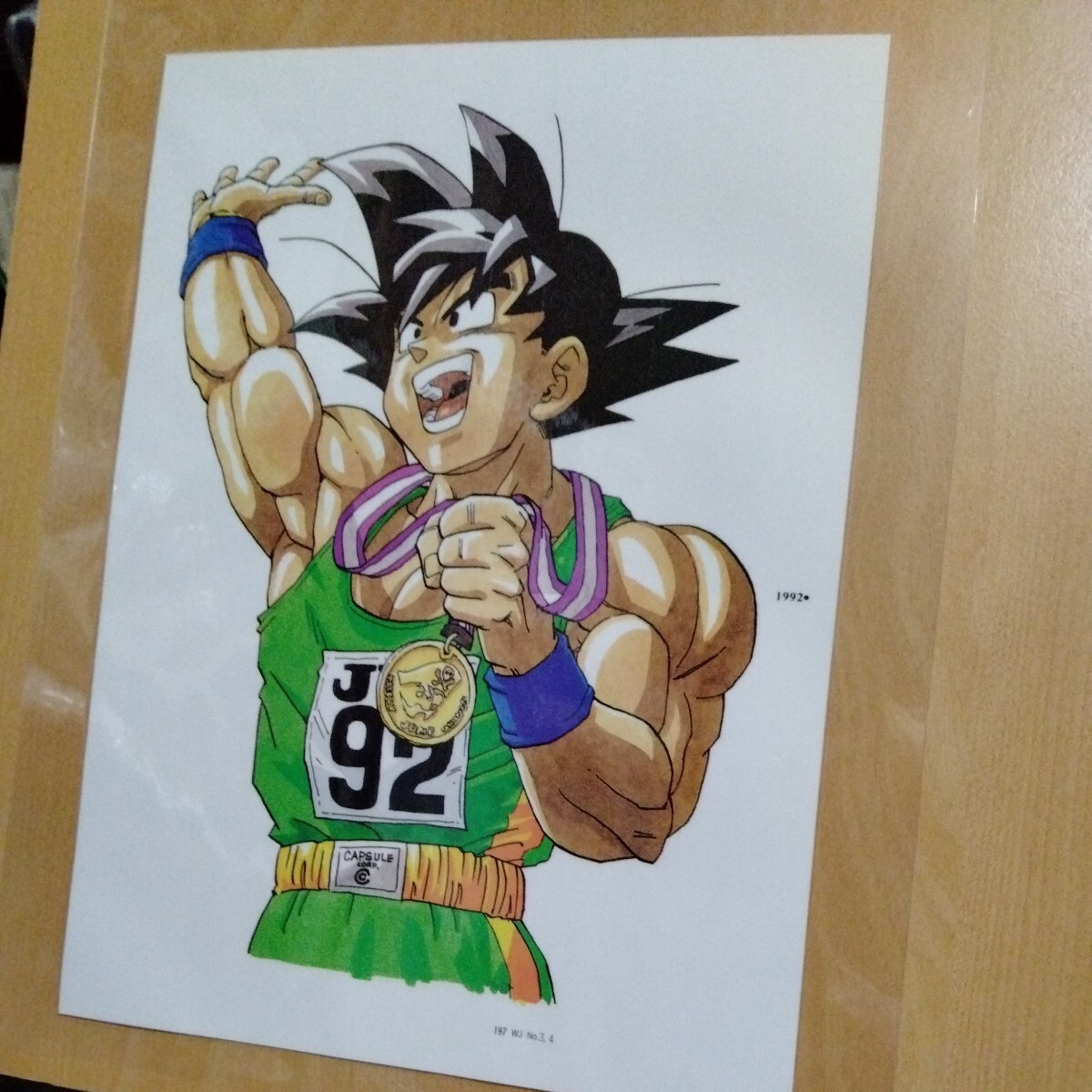 ドラゴンボールイラスト金メダルA4ラミネート雑誌切り抜きポスターインテリア広告鳥山明 悟空_画像1