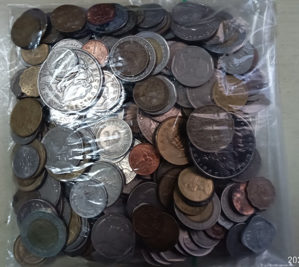 [ coin . summarize set ] foreign coin / coin / France / America / Spain / Thai / Malaysia / Japan / China / Taiwan / Hong Kong old coin / out ./ approximately 1 kilo and more 