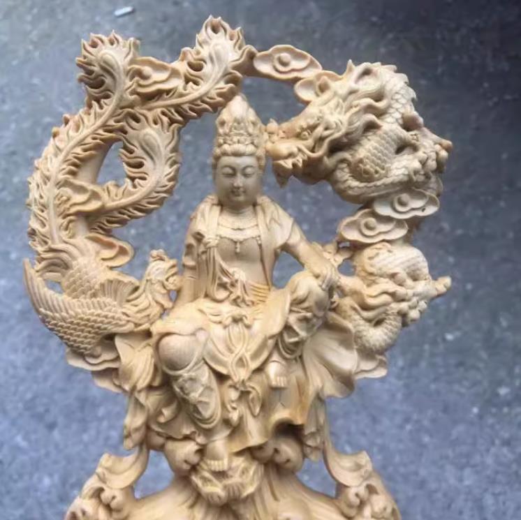  tree carving Buddhist image free . sound ornament . sound bodhisattva image sculpture Buddhism fine art precise skill 