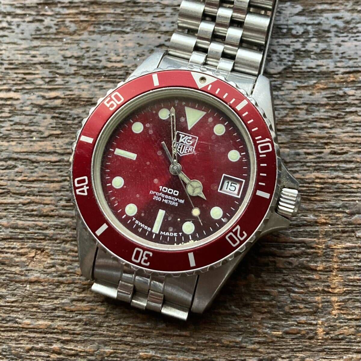 TAGHEUER タグホイヤー プロフェッショナル 1000 980.913 N クォーツ 希少 レッド ジャンク 未整備品_画像1