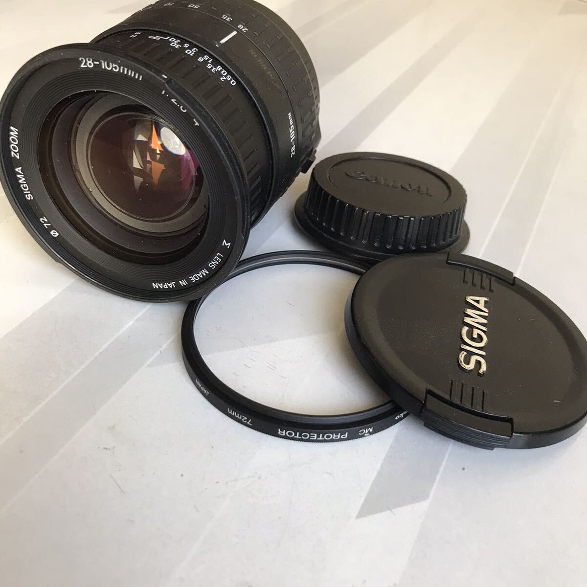 送料520円~SIGMA 28-105 mm 標準 レンズ ズーム kenko レンズフィルター 付 Canonのキャップをつけています。_画像1