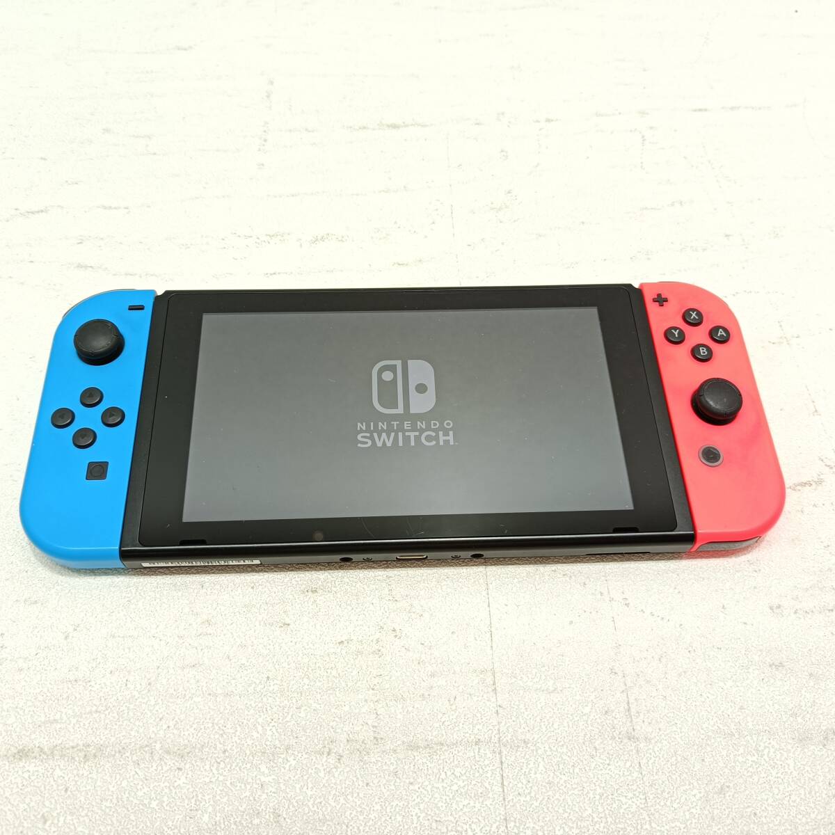 070）A〈中古品〉ニンテンドーSwitch 本体＋ジョイコンのみ(ネオンレッド/ネオンブルー) HAC‐001一部ジャンクあり【動作確認/初期化済】_画像1