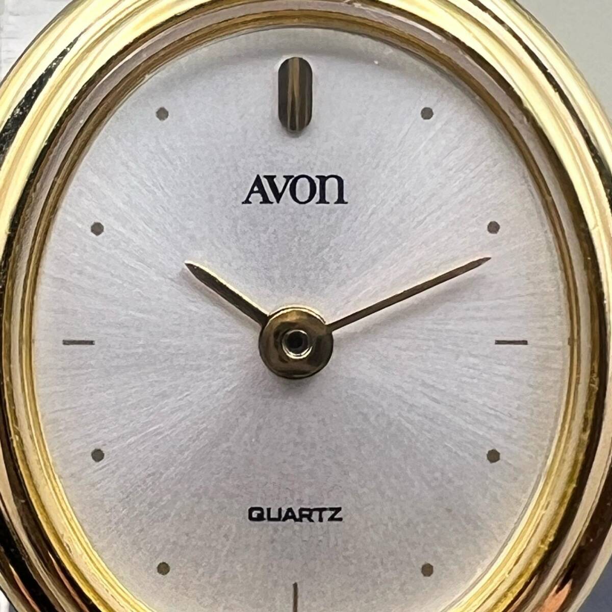 AVON アヴォン レディース腕時計 クォーツ オーバル BT シルバー文字盤 フェイクパール ラインストーン ラウンド 稼動品_画像4
