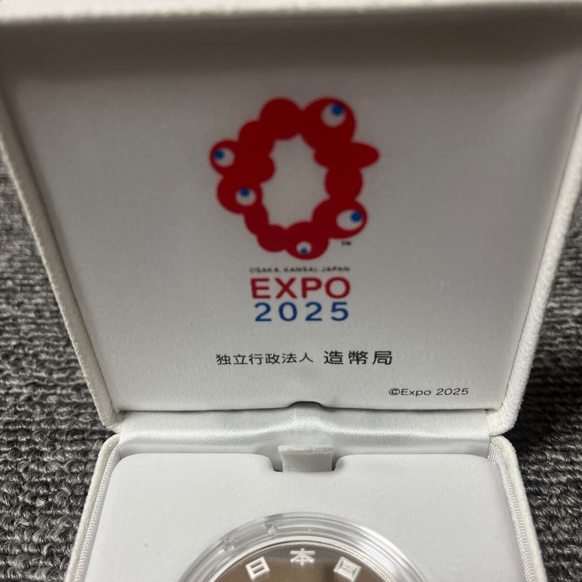 2025 год Япония международный . просмотр . память тысяч иен серебряная монета .( первый следующий выпуск ) серебряная монета памятная монета хранение товар структура . отдел EXPO2025