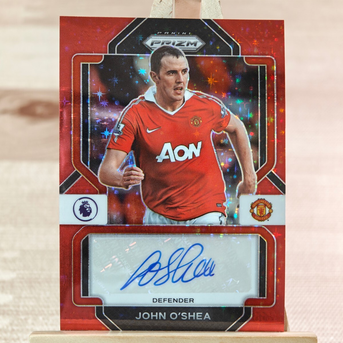 ジョン・オシェイ 2022-23 Panini Prizm Premier League Red Stars John O'Shea Auto Manchester United 直筆サインカードの画像1