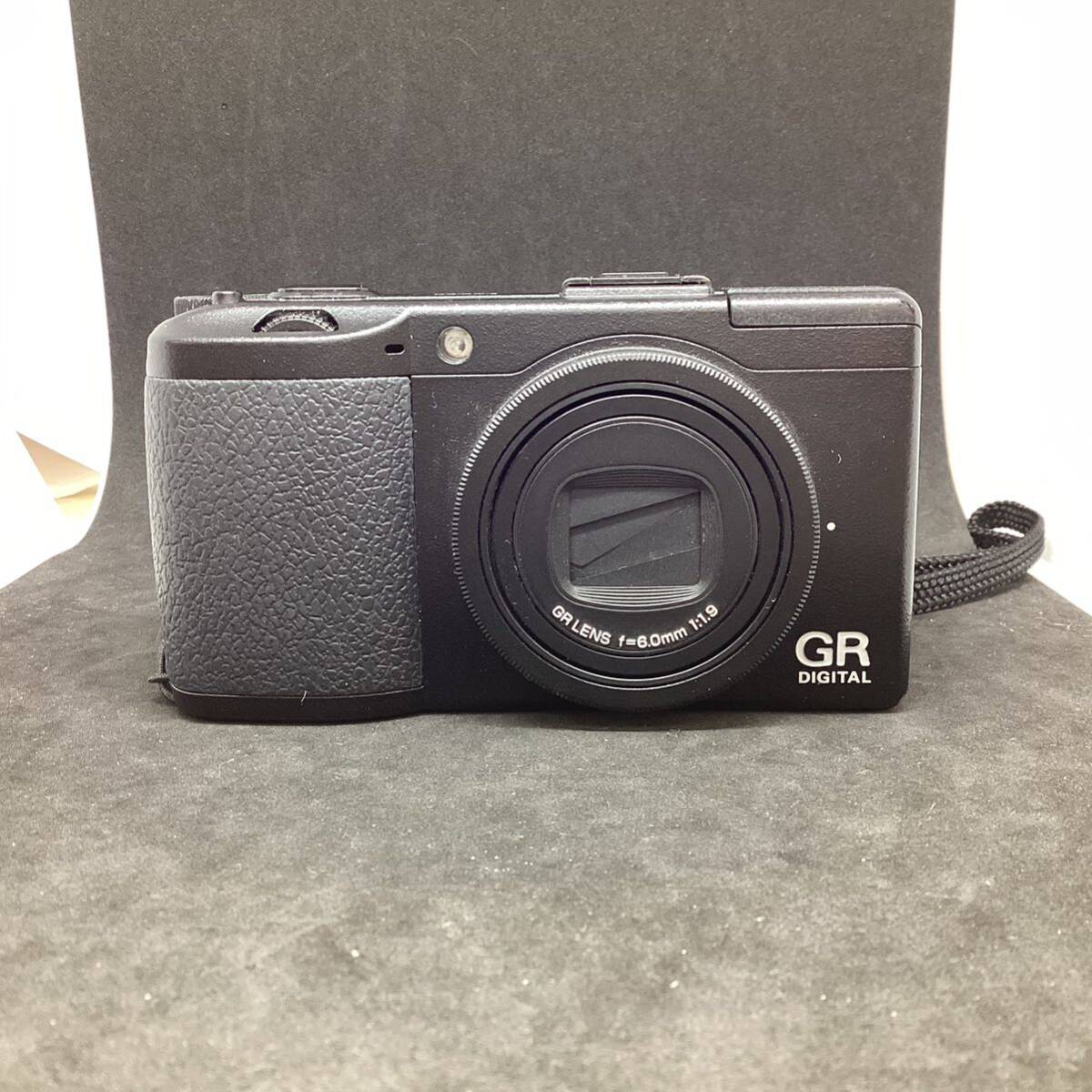 *[ operation goods ]RICOH GR DIGITAL Ⅲ 6.0mm 1:1.9 compact digital camera Ricoh digital camera black battery with charger . the first period . ending 