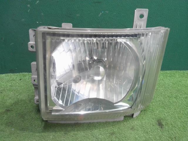 中古 エルフ NMS85 左ヘッドランプASSY 4JJ1 110-21873 8-97585-163-3_画像1