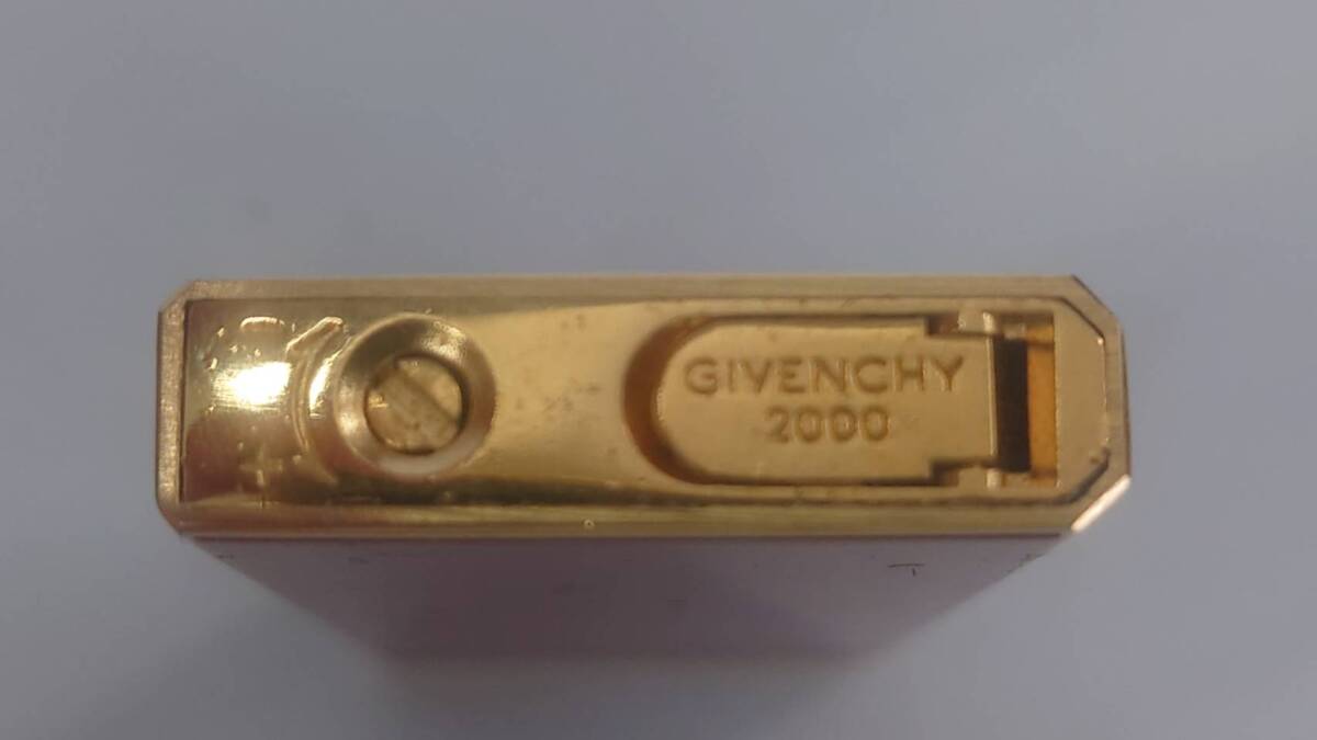 4801 [1 jpy start ]GIVENCHY Givenchy lighter roller type red smoking goods high class lighter spark OK