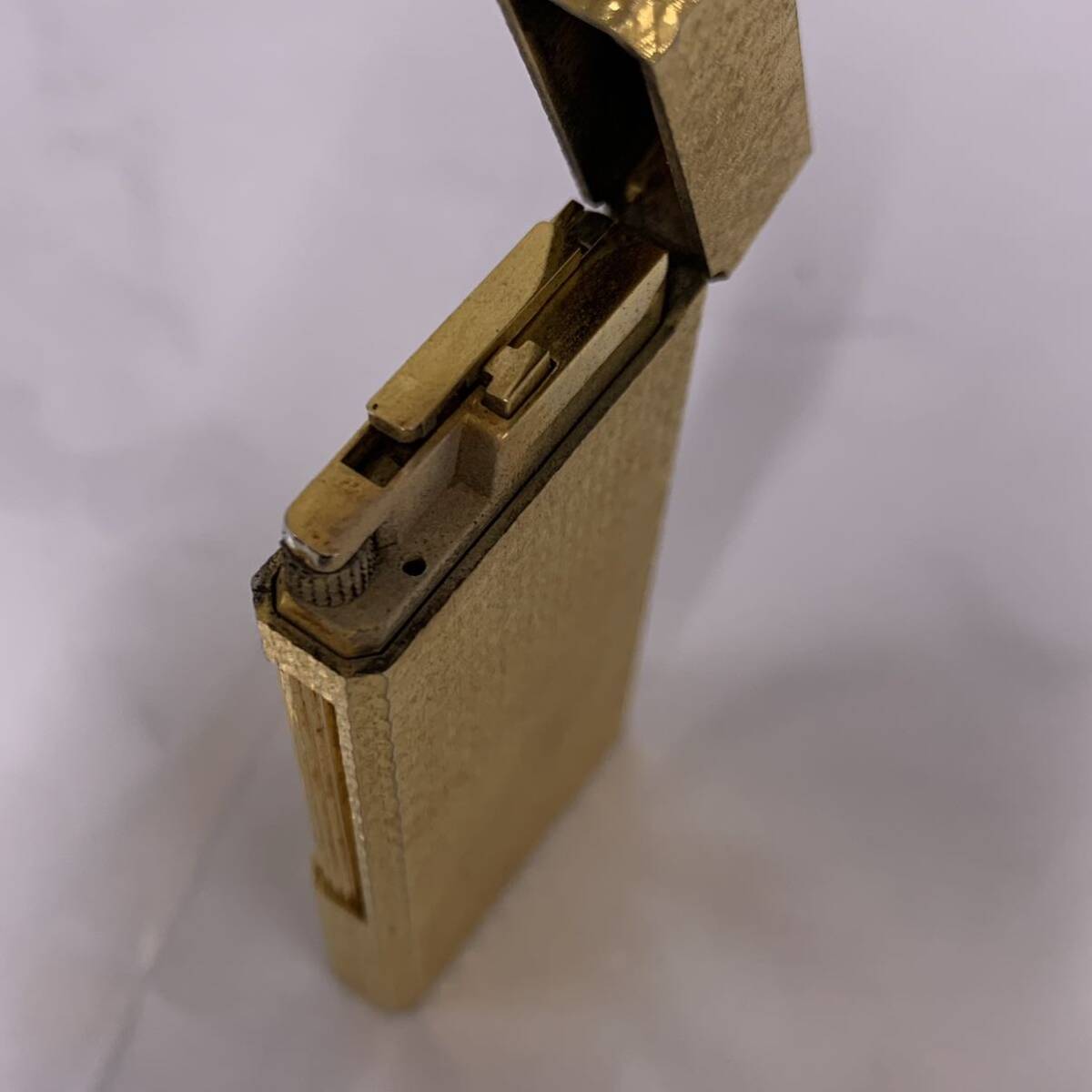  fire kind not yet verification smoking .GIVENCHY/ Givenchy 2000 gas lighter Gold color present condition goods ka4