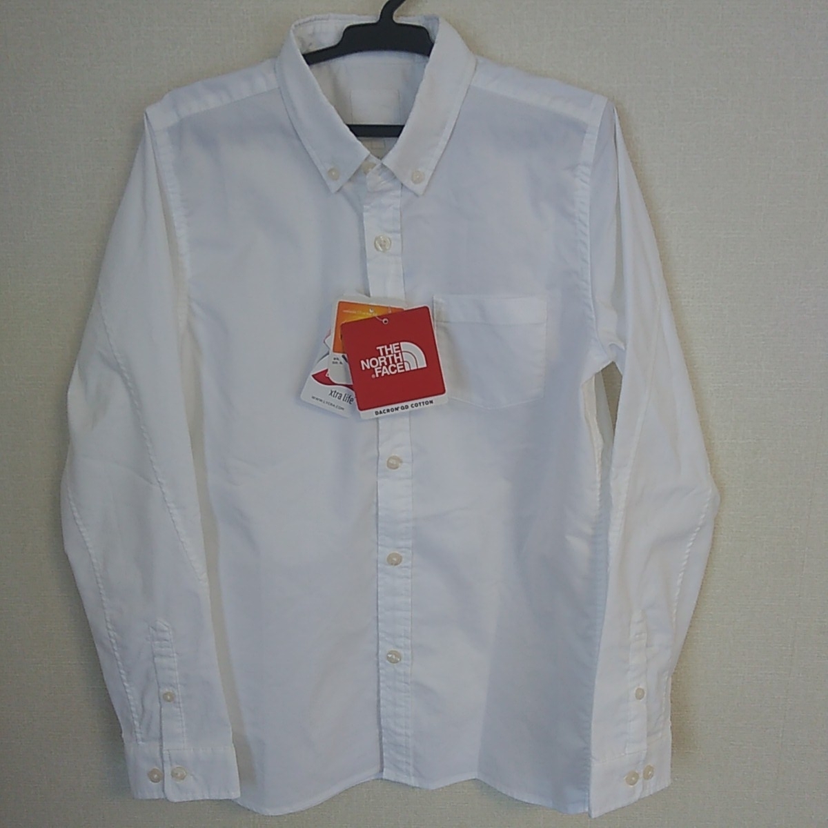 ノースフェイス　ウイメンズ　Yシャツ　ワイシャツ　Sサイズ　新品未使用　着丈62cm、身幅47cm　目立たない汚れがあります。