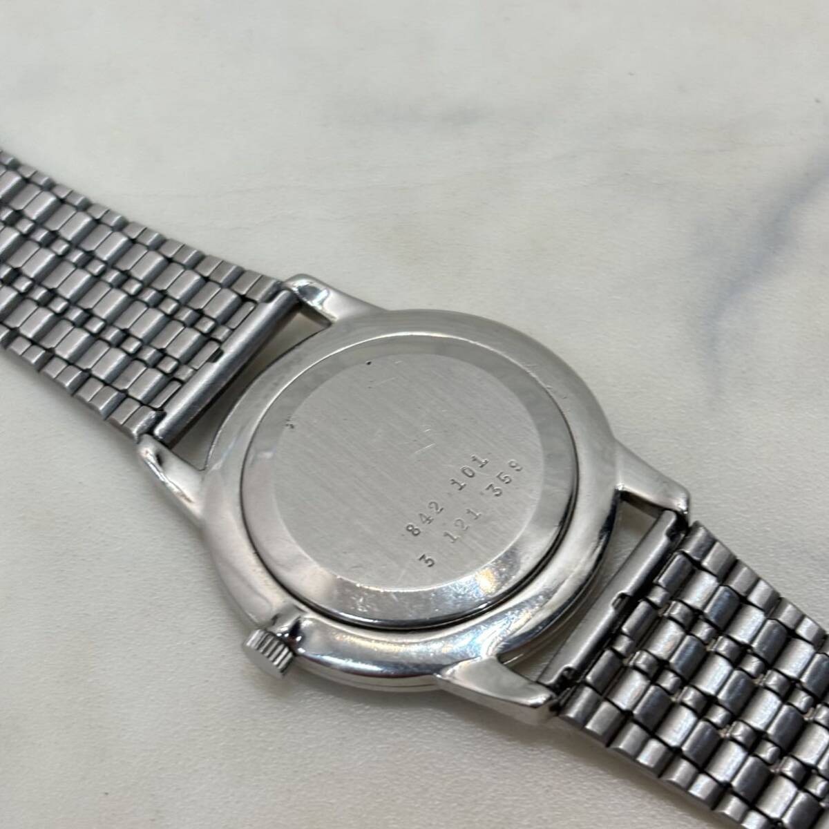稼働品 UNIVERSAL GENEVE ユニバーサルジュネーブ 842.101 手巻き 腕時計 スイス製 メンズ 白文字盤の画像9