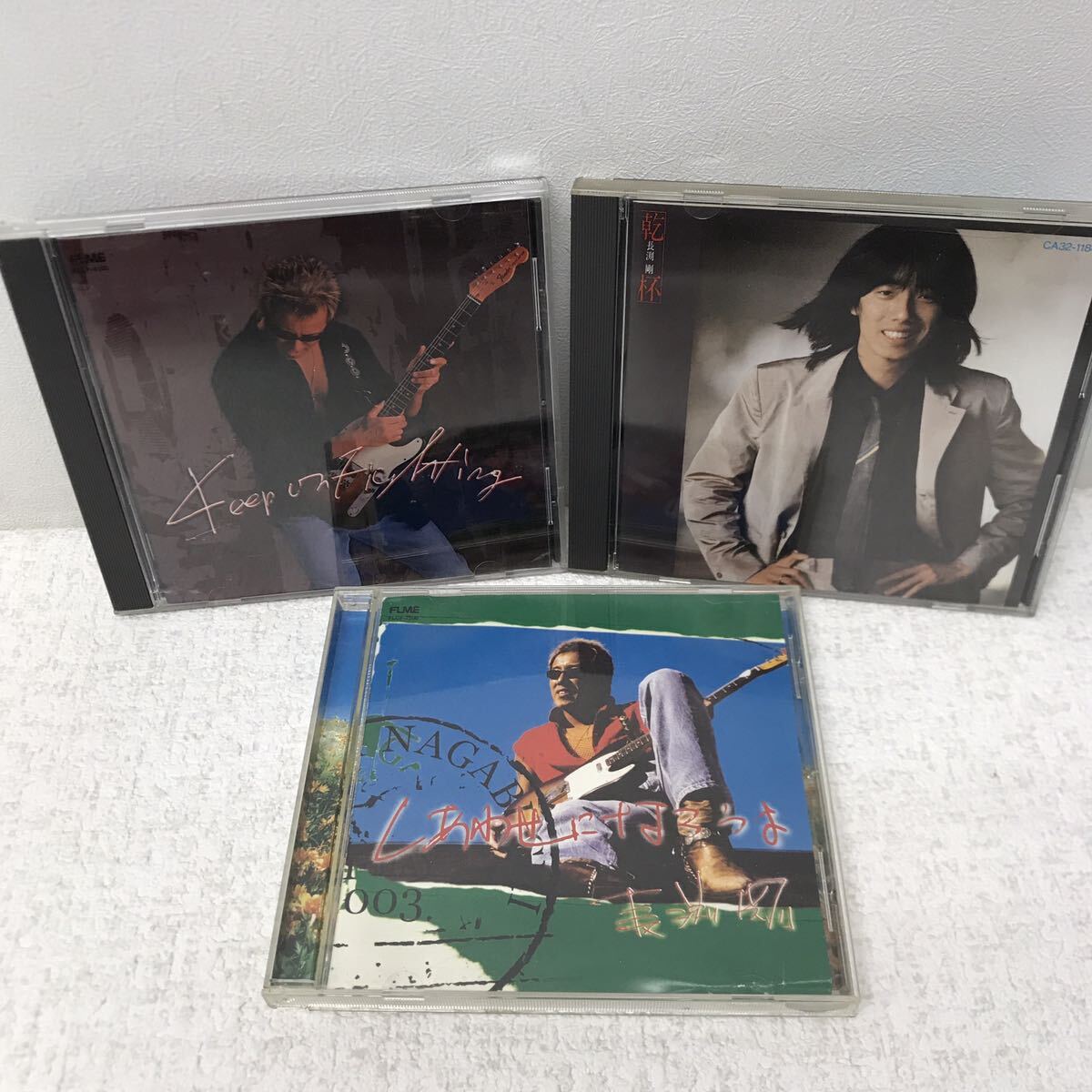 I0513F3 まとめ★長渕剛 CD 9巻セット 音楽 邦楽 / しあわせになろうよ / 乾杯 / 昭和 / いつかの少年 / ジープ / CLOSE YOUR EYES 他_画像3