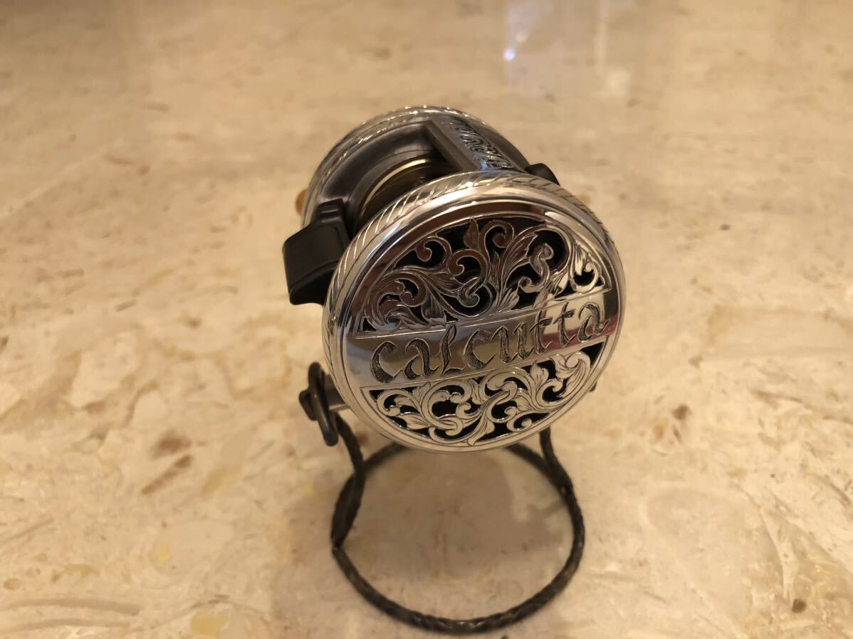 シマノ 05 カルカッタ101 透し彫り カスタム SHIMANO 彫金 シマノ 05 カルカッタ101 透し彫り カスタム SHIMANO 彫金