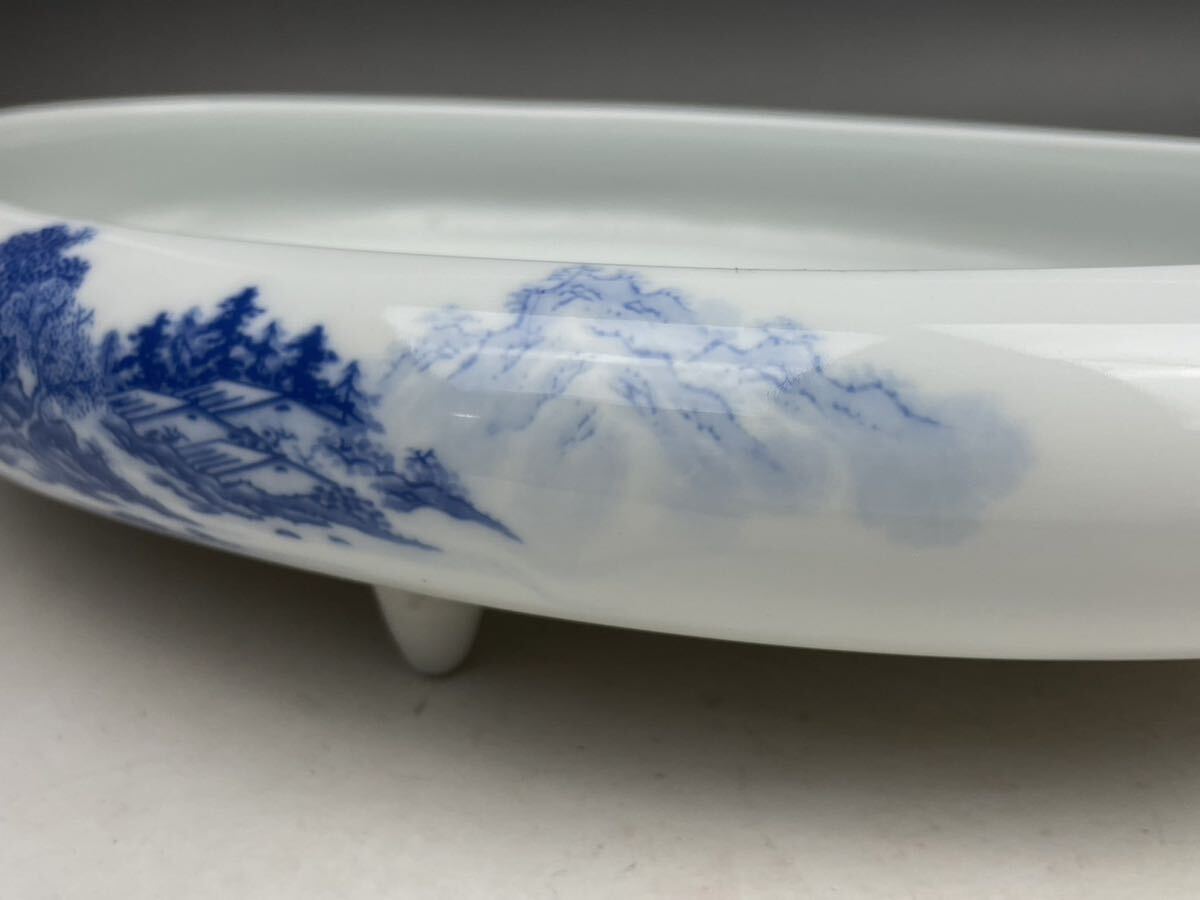 D) Arita .. mountain tradition industrial arts fine art handicraft landscape . flower vase blue and white ceramics landscape scenery water vessel water feature three pair ellipse Zaimei flower tool tea utensils bonsai pot water lily pot hour substitute article 