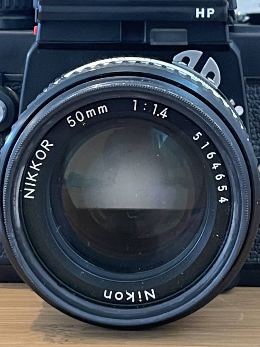 Nikon F3 single‐lens reflex camera NIKKOR 50mm 1:1.4 NIKKOR 35~105mm 1:3.5~4.5