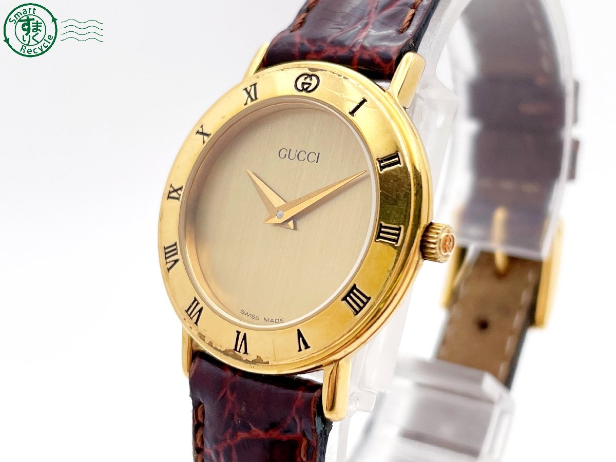 2405600977 ＃ GUCCI グッチ 3000.2.L クォーツ QZ 2針 アナログ 腕時計 ゴールド文字盤 純正ベルト ヴィンテージ 中古の画像2